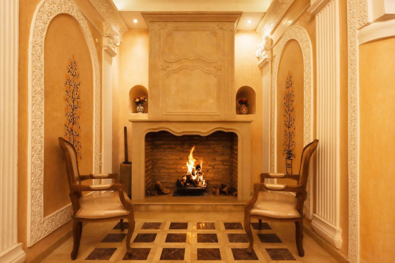 فندق Riad Palais Des Princesses & Spa مراكش المظهر الخارجي الصورة A fireplace in a home