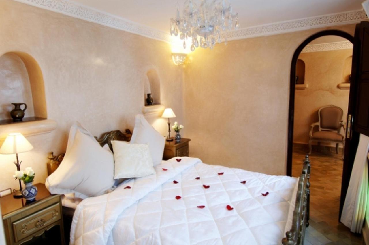 فندق Riad Palais Des Princesses & Spa مراكش الغرفة الصورة A bedroom at the hotel